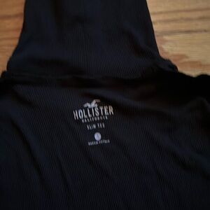 Women’s Hollister black slim fit turtleneck. Great condition.